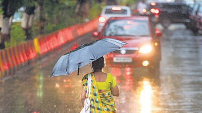 Mumbai, India - March 21, 2023: Heavy unseasonal rain takes people by surprise, at Airoli, Navi Mumbai, India, on Tuesday, March 21, 2023. (Photo by Satish Bate/ Hindustan Times) (Satish Bate/HT PHOTO) Mumbai, India - March 21, 2023: Heavy unseasonal rain takes people by surprise, at Airoli, Navi Mumbai, India, on Tuesday, March 21, 2023. (Photo by Satish Bate/ Hindustan Times) (Satish Bate/HT PHOTO)