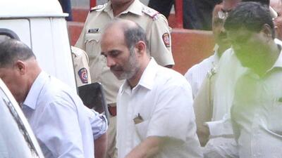 Mumbai, India, June 11, 2016: Dr. Virendra Tawade (in white shirt with beard) who was arrested yesterday by CBI in connection with Narendra Dabholkar murder case, being produced in local court in Pune, India on 11 June 2016. HT Photo Mumbai, India, June 11, 2016: Dr. Virendra Tawade (in white shirt with beard) who was arrested yesterday by CBI in connection with Narendra Dabholkar murder case, being produced in local court in Pune, India on 11 June 2016. HT Photo