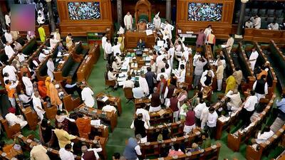 Opposition MPs raise slogans in the well of Lok Sabha demanding a Joint Parliamentary Committee probe into the Adani Group issue during the second phase of the budget session of the Parliament, in New Delhi on Tuesday. (ANI) Opposition MPs raise slogans in the well of Lok Sabha demanding a Joint Parliamentary Committee probe into the Adani Group issue during the second phase of the budget session of the Parliament, in New Delhi on Tuesday. (ANI)