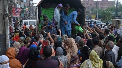 Pakistan's Prime Minister Shehbaz Sharif announced to provide free flour to the needy people during the Ramadan in the wake of country's soaring inflation. (AFP) Pakistan's Prime Minister Shehbaz Sharif announced to provide free flour to the needy people during the Ramadan in the wake of country's soaring inflation. (AFP)