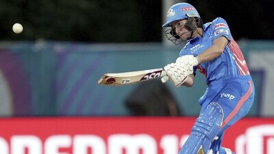 Issy Wong plays a shot, which results in a catch during the Women's Premier League match between Mumbai Indians and Royal Challengers Bangalore (PTI)
