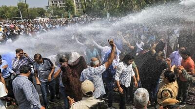 Police use water cannons to disperse protesting doctors in Jaipur on Tuesday. (PTI) Police use water cannons to disperse protesting doctors in Jaipur on Tuesday. (PTI)