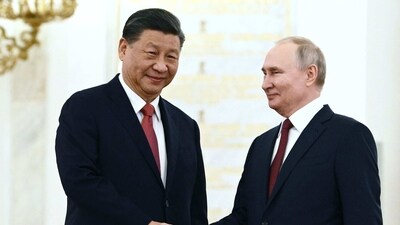 Russian President Vladimir Putin meets with China's President Xi Jinping at the Kremlin in Moscow on March 21. (AFP)