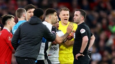 Fulham's Aleksandar Mitrovic and teammates react after he is shown a red card by referee Chris Kavanagh (REUTERS)