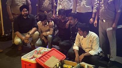 The five suspects with the seized liquor. (HT Photo) The five suspects with the seized liquor. (HT Photo)