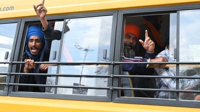 Fugitive Khalistan separatist leader Amritpal Singh's supporters being detained by the Punjab police. (Sanjeev Sharma/ Hindustan Times) Fugitive Khalistan separatist leader Amritpal Singh's supporters being detained by the Punjab police. (Sanjeev Sharma/ Hindustan Times)
