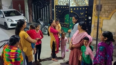 People gathered outside their homes after strong quakes rattled north India. (HT) People gathered outside their homes after strong quakes rattled north India. (HT)
