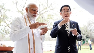 Japanese PM Fumio Kishida trying golgappe with PM Modi in New Delhi on Monday. Japanese PM Fumio Kishida trying golgappe with PM Modi in New Delhi on Monday.