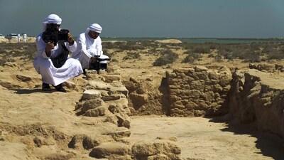 Journalists film uncovered ruins on Siniyah Island in Umm al-Quwain, United Arab Emirates, Monday, March 20, 2023. Archaeologists said Monday they have found the oldest pearling town in the Persian Gulf on an island off one of the northern sheikhdoms of the United Arab Emirates. (AP) Journalists film uncovered ruins on Siniyah Island in Umm al-Quwain, United Arab Emirates, Monday, March 20, 2023. Archaeologists said Monday they have found the oldest pearling town in the Persian Gulf on an island off one of the northern sheikhdoms of the United Arab Emirates. (AP)
