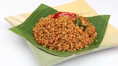 Pulihora: Pulihora or tamarind rice is a traditional South Indian dish made with cooked rice, tamarind pulp, and spices. It is a tangy and flavorful dish that is perfect for any festive occasion. (Unsplash) Pulihora: Pulihora or tamarind rice is a traditional South Indian dish made with cooked rice, tamarind pulp, and spices. It is a tangy and flavorful dish that is perfect for any festive occasion. (Unsplash)
