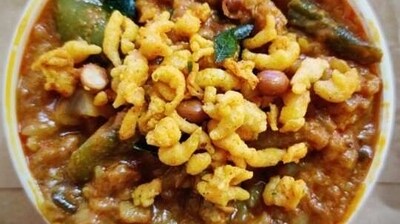 Bisi Bele Bath: Bisi bele bath is a spicy rice dish made with vegetables, lentils, and spices. It is a popular dish in Karnataka and is often served with raita and papad. (Unsplash) Bisi Bele Bath: Bisi bele bath is a spicy rice dish made with vegetables, lentils, and spices. It is a popular dish in Karnataka and is often served with raita and papad. (Unsplash)