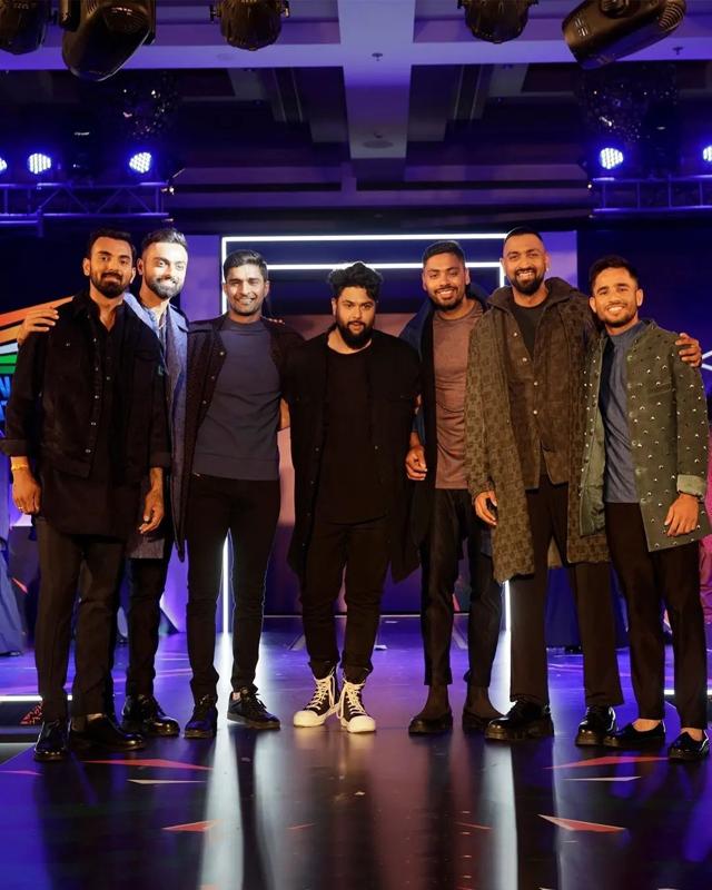 Kunal Rawal with the Indian cricket team who modelled for him Kunal Rawal with the Indian cricket team who modelled for him