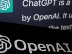 The logo of OpenAI is displayed near a response by its AI chatbot ChatGPT on its website.