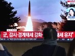 A TV screen shows a file image of North Korea's missile launch during a news program at the Seoul Railway Station in Seoul, South Korea,