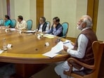 Prime Minister Narendra Modi chairs a high-level meeting to review the covid situation amid rise in cases in the country and to take stock of the public health preparedness, in New Delhi.