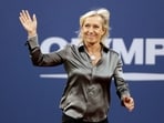 Former tennis star Martina Navratilova waves to the crowd as she is honoured during the opening ceremony of the US Open