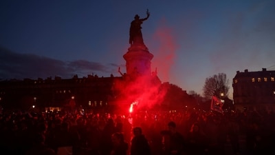 Protesters seen at the Place de la Republique during a demonstration, one day after the pension reform was adopted as the French Parliament rejected two motions of no-confidence against the government. in Paris, France, March 21. Atleast 234 protestors were detained, reported AP. (Gonzalo Fuentes / REUTERS) Protesters seen at the Place de la Republique during a demonstration, one day after the pension reform was adopted as the French Parliament rejected two motions of no-confidence against the government. in Paris, France, March 21. Atleast 234 protestors were detained, reported AP. (Gonzalo Fuentes / REUTERS)