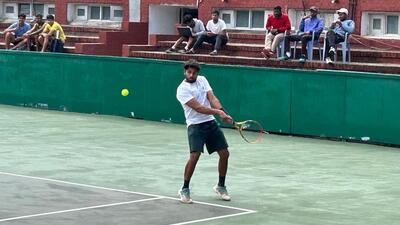 A player in action during the AITA National Ranking Tennis Championship at the CLTA Stadium in Sector 10, Chandigarh. (HT Photo)