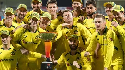 Australia's David Warner, center, gestures as he and teammates pose with the winners trophy after their win in the third and last one day international cricket match against India in Chennai, India, Wednesday, March 22, 2023. Australia won the series 2-1. (AP Photo/Aijaz Rahi) (AP) Australia's David Warner, center, gestures as he and teammates pose with the winners trophy after their win in the third and last one day international cricket match against India in Chennai, India, Wednesday, March 22, 2023. Australia won the series 2-1. (AP Photo/Aijaz Rahi) (AP)