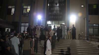 Police officers and people gather at a hospital where earthquake victims are brought, in Pakistan's Swat valley. (AP) Police officers and people gather at a hospital where earthquake victims are brought, in Pakistan's Swat valley. (AP)
