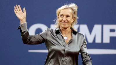 Former tennis star Martina Navratilova waves to the crowd as she is honoured during the opening ceremony of the US Open (REUTERS)