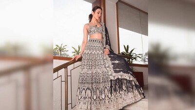 Rakul Preet's lehenga comes with a strappy blouse with full embroidery work and a georgette dupatta with broad border work. (Instagram/@rakulpreet) Rakul Preet's lehenga comes with a strappy blouse with full embroidery work and a georgette dupatta with broad border work. (Instagram/@rakulpreet)