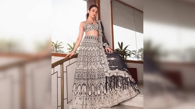 Rakul Preet's navy blue lehenga set is from the clothing house of designer Seema Gujral. (Instagram/@rakulpreet) Rakul Preet's navy blue lehenga set is from the clothing house of designer Seema Gujral. (Instagram/@rakulpreet)