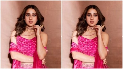 Sara decked up in a pink slip blouse with an asymmetrical hem, showing off her toned midriff. She further teamed it with a long and flowy pink silk skirt featuring golden embellishment details at the waist.&nbsp; (Instagram/@saraalikhan95)