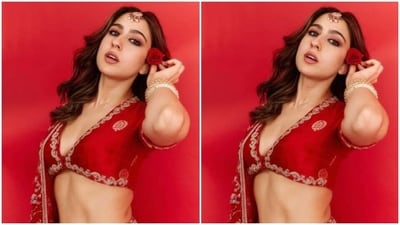 Here's a picture of Sara looking stunning in the red lehenga featuring silver embellishments and minimal accessory.&nbsp; (Instagram/@saraalikhan95)