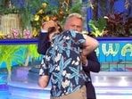 Pat Sajak with the winner Fletcher-Jackson on Wheel of Fortune.
