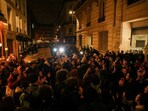 Protesters gather during a demonstration after the pension reform was adopted in France.