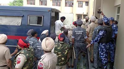 Associates of 'Waris Punjab De' chief Amritpal Singh brought to Baba Bakala Court amid heavy police presence, in Amritsar, India on Thursday. (ANI)