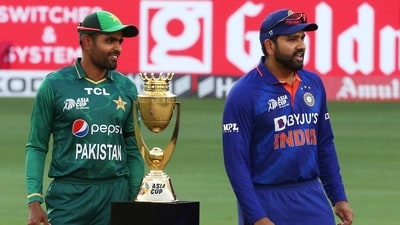 India's Rohit Sharma and Pakistan's Babar Azam pose with the Asia Cup trophy after the toss (REUTERS)