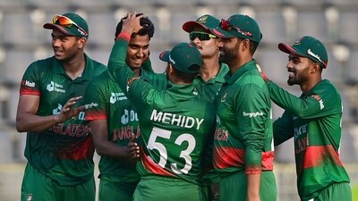 Bangladesh's Hasan Mahmud (2L) celebrates with teammates after taking the wicket of Ireland's Graham Hume (not pictured) during the third and final one-day international (ODI) cricket match between Bangladesh and Ireland at the Sylhet International Cricket Stadium in Sylhet on March 23, 2023. (Photo by Munir uz ZAMAN / AFP) (AFP) Bangladesh's Hasan Mahmud (2L) celebrates with teammates after taking the wicket of Ireland's Graham Hume (not pictured) during the third and final one-day international (ODI) cricket match between Bangladesh and Ireland at the Sylhet International Cricket Stadium in Sylhet on March 23, 2023. (Photo by Munir uz ZAMAN / AFP) (AFP)