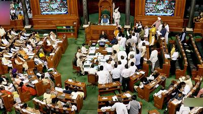 Opposition MPs stage a protest in Lok Sabha. (ANI) Opposition MPs stage a protest in Lok Sabha. (ANI)