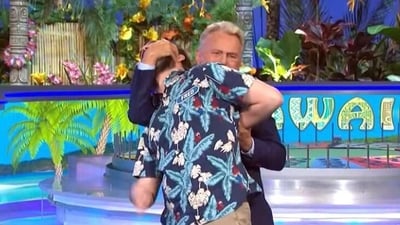 Pat Sajak with the winner Fletcher-Jackson on Wheel of Fortune. Pat Sajak with the winner Fletcher-Jackson on Wheel of Fortune.