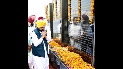 Punjab Chief Minister Bhagwant Mann pays tribute to Bhagat Singh on the occasion of 'Shaheed Diwas', at Khatkar Kalan, in Shahid Bhagat Singh Nagar on Thursday. (ANI Photo) Punjab Chief Minister Bhagwant Mann pays tribute to Bhagat Singh on the occasion of 'Shaheed Diwas', at Khatkar Kalan, in Shahid Bhagat Singh Nagar on Thursday. (ANI Photo)