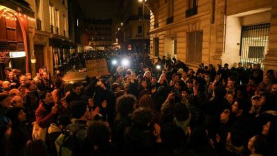Protesters gather during a demonstration after the pension reform was adopted in France. (Reuters) Protesters gather during a demonstration after the pension reform was adopted in France. (Reuters)