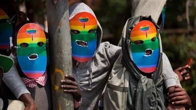 Gays and lesbians and others supporting their cause wear masks to preserve their anonymity as they stage a rare protest against Uganda's tough stance against homosexuality. (AP file) Gays and lesbians and others supporting their cause wear masks to preserve their anonymity as they stage a rare protest against Uganda's tough stance against homosexuality. (AP file)