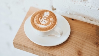 Latte: A latte is a coffee drink that is made with espresso and steamed milk, often topped with foam. This is a creamy and indulgent drink that can be flavored with syrups like vanilla or caramel. (Unsplash) Latte: A latte is a coffee drink that is made with espresso and steamed milk, often topped with foam. This is a creamy and indulgent drink that can be flavored with syrups like vanilla or caramel. (Unsplash)
