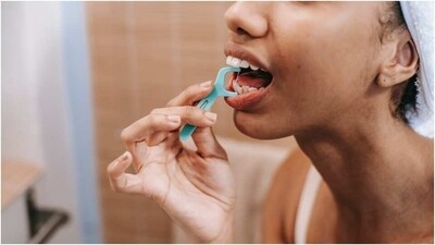 Floss Daily: Flossing can help remove plaque and food particles between your teeth and along your gum line that your toothbrush may miss. Floss at least once a day.&nbsp; (Pexels)