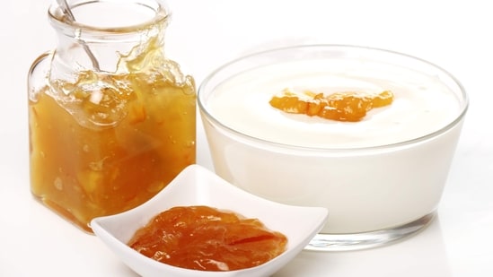 Milk and honey: Mix equal parts of milk and honey and apply it to your hands. Let it sit for 10-15 minutes before rinsing off with warm water. The lactic acid in milk helps to exfoliate dead skin cells while honey moisturizes the skin.&nbsp;(Freepik)