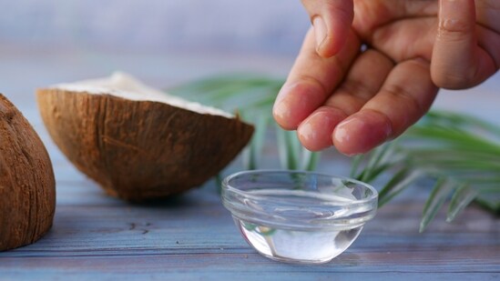Coconut oil: Apply a small amount of coconut oil to your hands and massage gently until it is fully absorbed. Coconut oil is rich in fatty acids and vitamin E, which can help moisturize and nourish your skin, leaving it soft and smooth.&nbsp;(pexels)