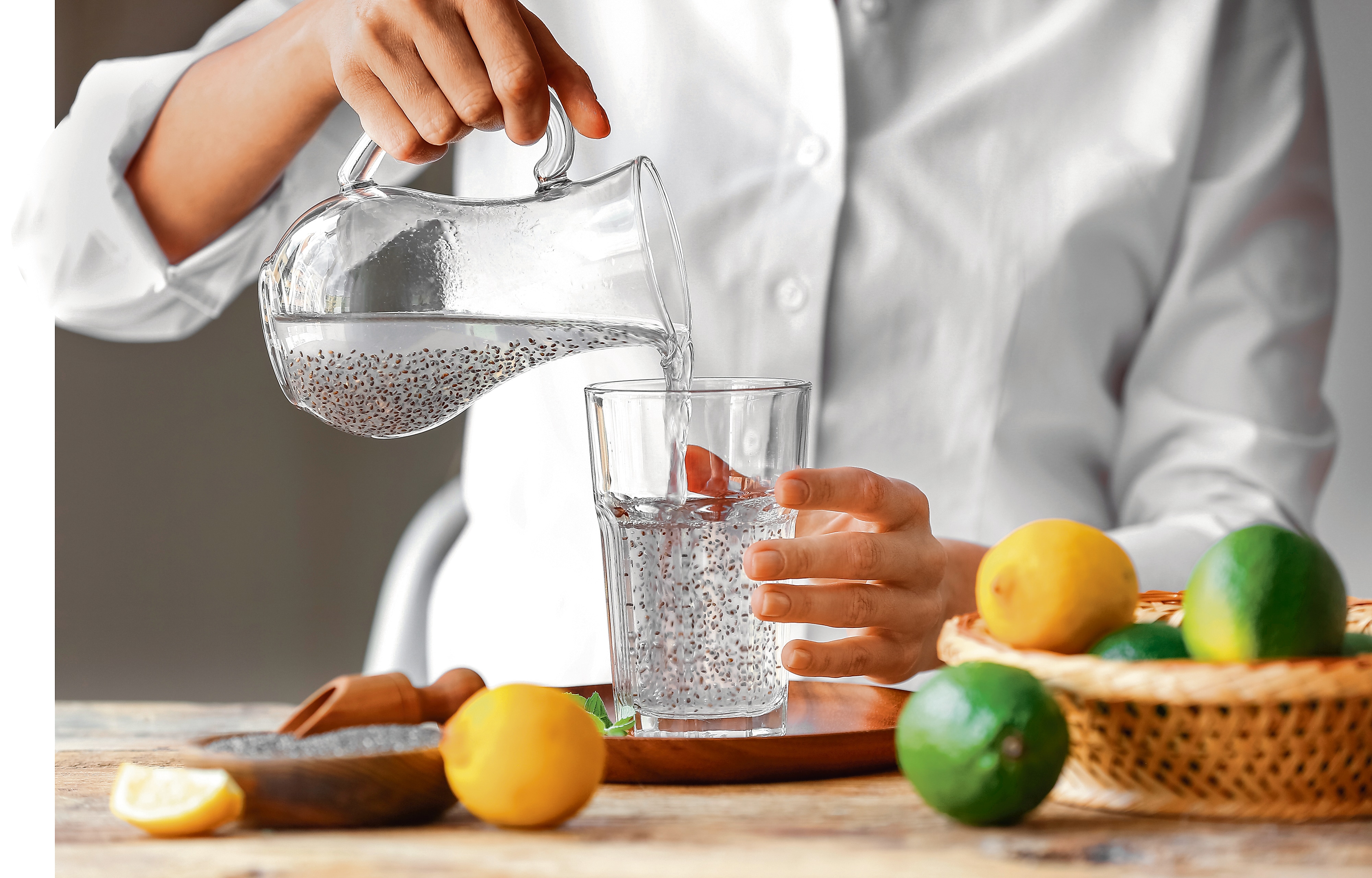 Woman pouring drink with chia seeds into glass (Shutterstock) Woman pouring drink with chia seeds into glass (Shutterstock)
