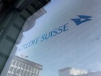 Logos of Swiss banks UBS and Credit Suisse are seen in Zurich, Switzerland.