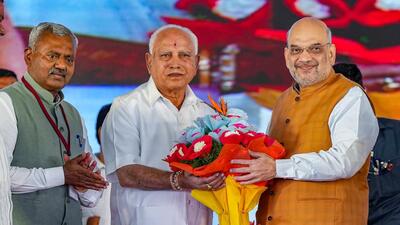 Amit Shah’s gesture at the breakfast meeting with senior leader BS Yediyurappa in Bengaluru has sent a strong political message (PTI) Amit Shah’s gesture at the breakfast meeting with senior leader BS Yediyurappa in Bengaluru has sent a strong political message (PTI)