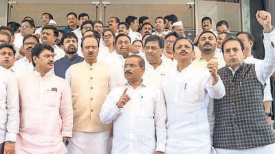 Mumbai, India - March 24, 2023: Opposition party MLAs and MLCs stage a walk-out from the Maharashtra Assembly in protest against the disqualification of Congress leader Rahul Gandhi from the Parliament after the Surat Court defamation verdict, during the Maharashtra Budget Session, at Vidhan Bhavan, in Nariman Point, in Mumbai, India, on Friday, March 24, 2023. (Photo by Satish Bate/ Hindustan Times) (Satish Bate/HT PHOTO) Mumbai, India - March 24, 2023: Opposition party MLAs and MLCs stage a walk-out from the Maharashtra Assembly in protest against the disqualification of Congress leader Rahul Gandhi from the Parliament after the Surat Court defamation verdict, during the Maharashtra Budget Session, at Vidhan Bhavan, in Nariman Point, in Mumbai, India, on Friday, March 24, 2023. (Photo by Satish Bate/ Hindustan Times) (Satish Bate/HT PHOTO)