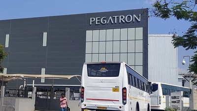 Employee buses enter the Pegatron facility near Chennai. (REUTERS)