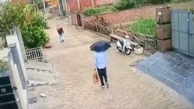 The latest CCTV footage shows Amtitpal Singh in a shirt and pants walking in a residential area in Haryana with an umbrella over his head.