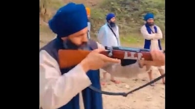 Videos recovered from a mobile phone of Tajinder Singh Gill show firearms practice by youngsters allegedly picked for Amritpal Singh's Anandpur Khalistan Fauz (AKF). (Screenshot) Videos recovered from a mobile phone of Tajinder Singh Gill show firearms practice by youngsters allegedly picked for Amritpal Singh's Anandpur Khalistan Fauz (AKF). (Screenshot)